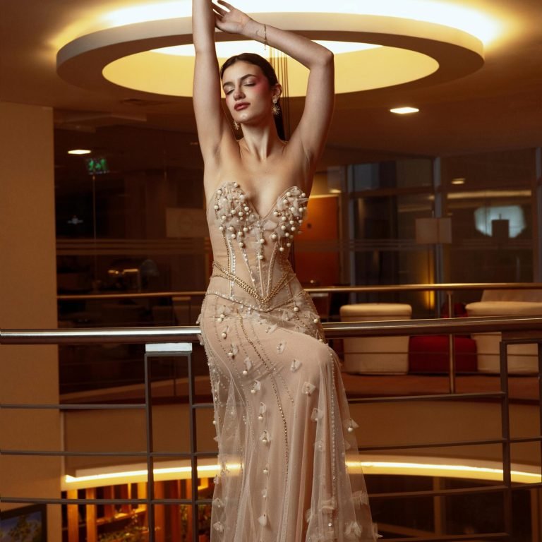 Model posing in building lobby